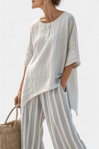 Talvora | Blusa Asimétrica Elegante y Pantalón de Rayas