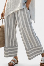 Talvora | Blusa Asimétrica Elegante y Pantalón de Rayas